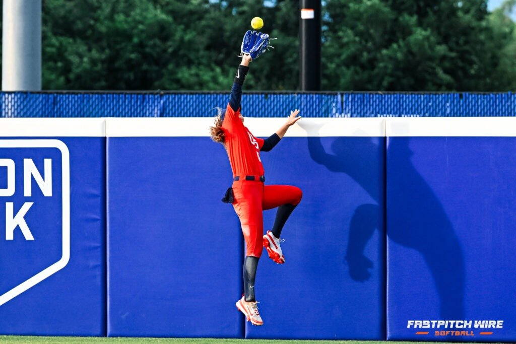 Jayda Coleman goes up to rob a homer at the USA Softball All-Star Showcase for Team USA.