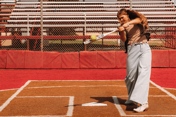 Hannah Wells swinging bat