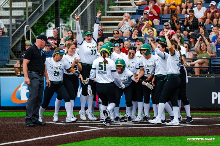 team meets at home plate after a home run.