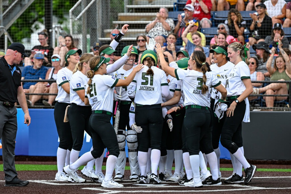 Talons team meets at home plate.